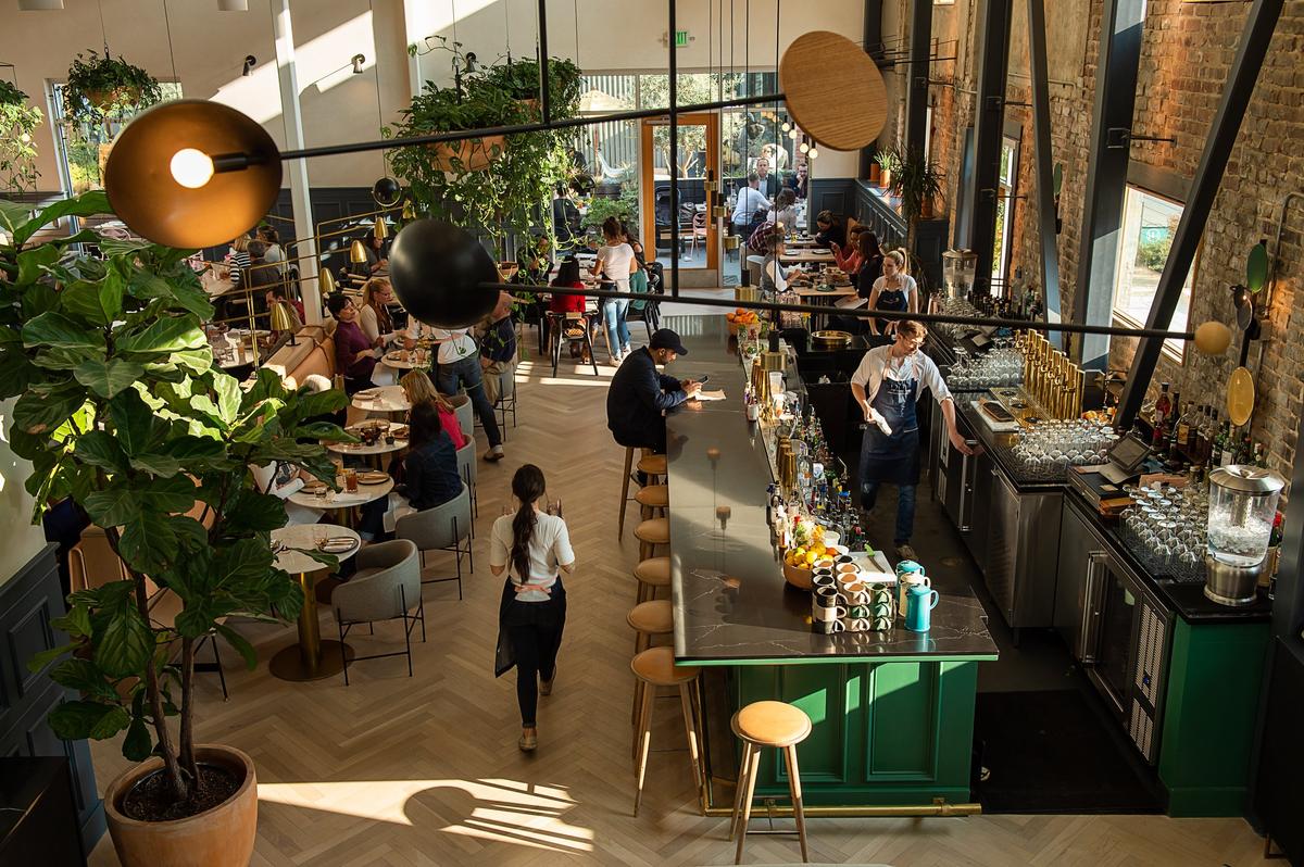 Customers enjoy the bar and main dining room at Beast and Bounty in midtown Sacramento in 2018.