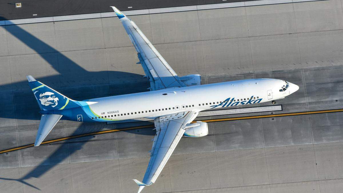 A former Army officer was sentenced to prison after he was accused of sexual assaults on flights to Seattle, feds say.