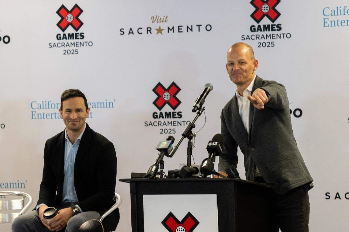 Sacramento Mayor Kevin McCarty, joined at the podium by X Games host Brandon Graham, points to some of the competitors in the event after the announcement Dec. 12, 2024, that the games would be held at Cal Expo in Sacramento for at least three years starting in 2025. X Games officials on Friday said that the 2025 event in Sacramento has been canceled.