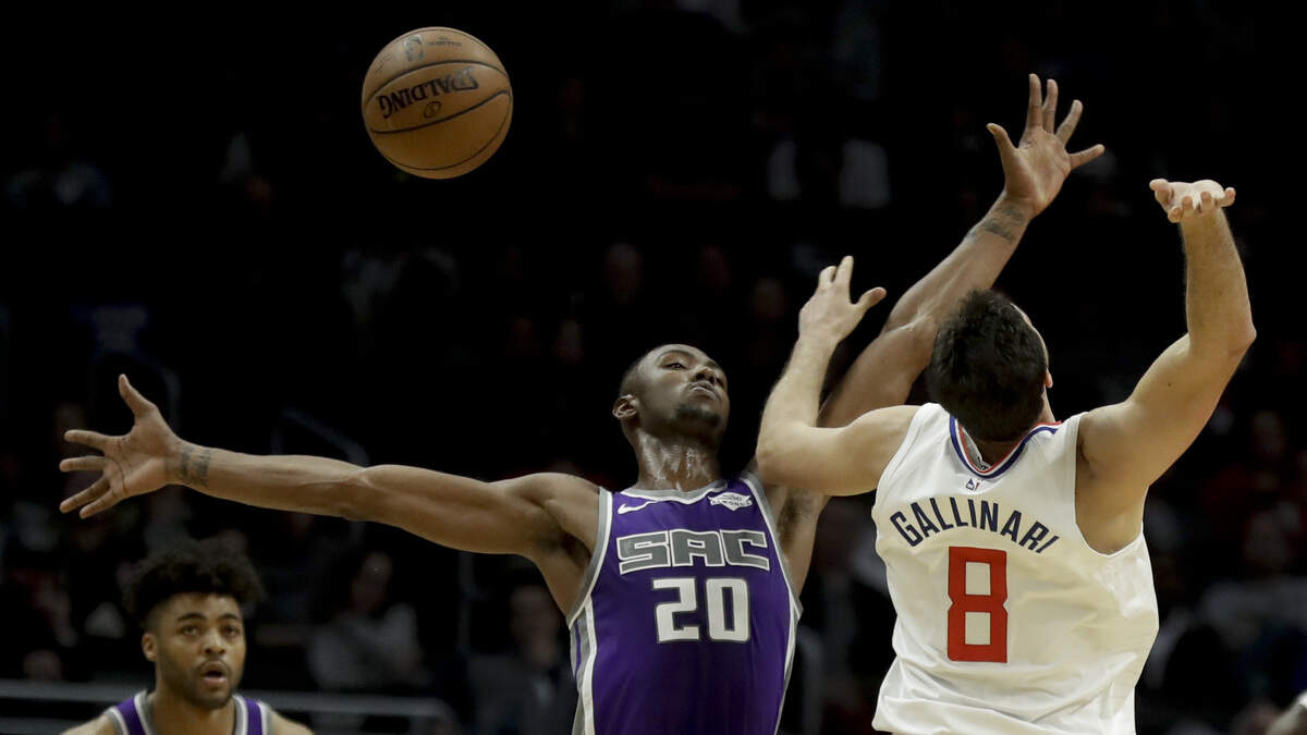 Harry Giles III, center, Frank Mason III and the Kings’ reserves nearly rallied from a 27-point deficit against Danilo Gallinari and the Los Angeles Clippers on Wednesday at Staples Center.