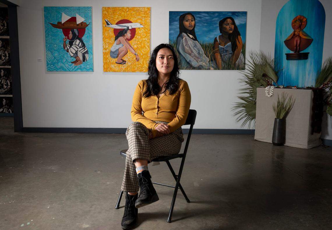 Artist Franceska Gamez, who curated and contributed to the Kapwa Exhibition at Sacramento’s 1810 Gallery in 2020, sits in the middle of the exhibit. Gamez received CARES Act funds.
