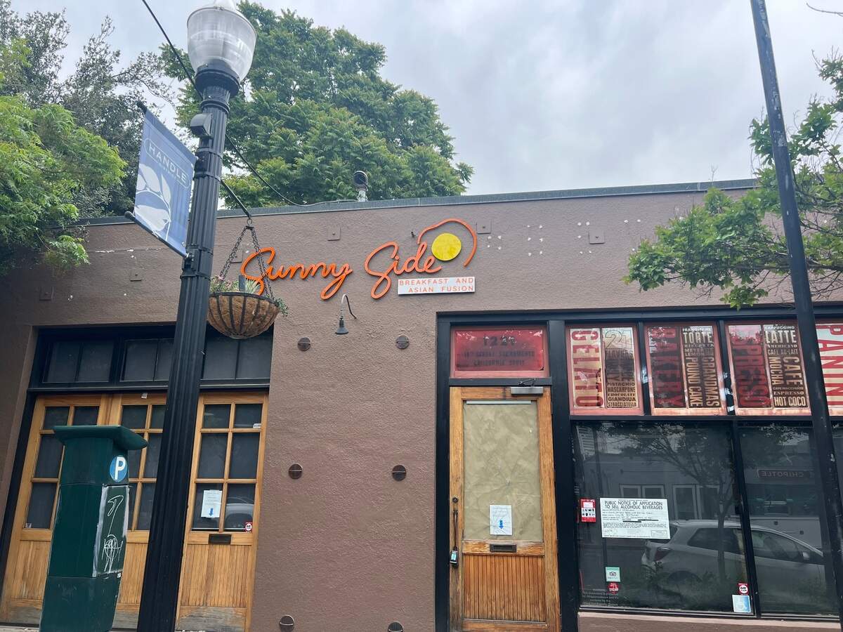 The sign for new midtown Asian-fusion breakfast restaurant Sunny Side hangs on 19th Street in Sacramento on Wednesday.
