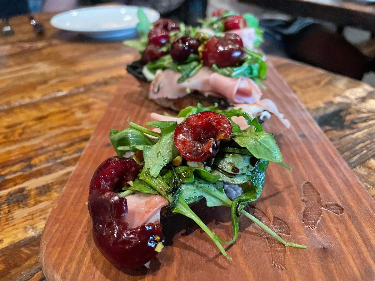 Hawks Public House tops its mortadella tartines with cherries from Saeng’s Strawberry Stand in Granite Bay.