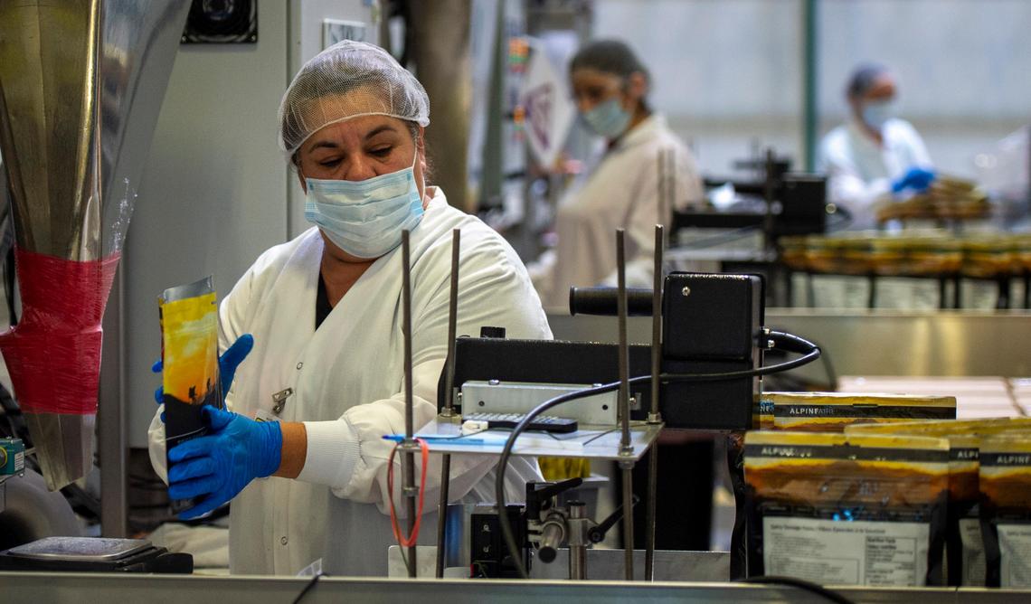 Rebecca Chavez fills pouches of freeze-dried survivalist food in a production line at Katadyn North America Foods in Rocklin on Thursday, March 5, 2020, keeping up with an usually high demand for the supply company. Earlier this week, California’s first COVID-19 death was announced in Placer County.
