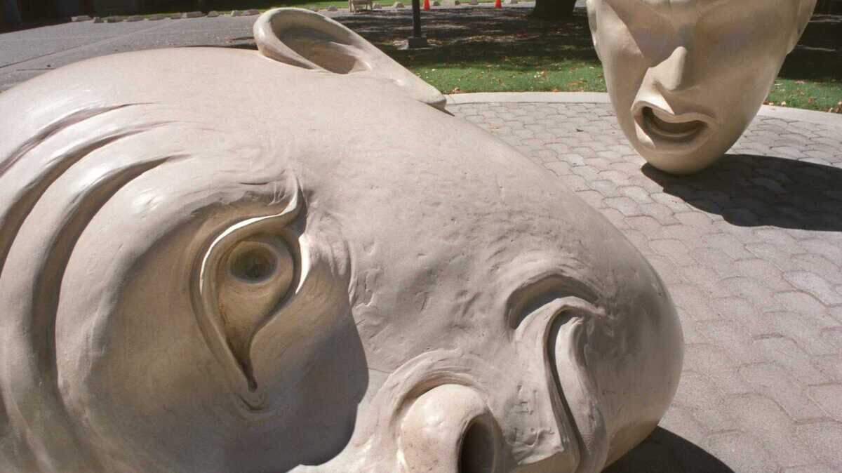 Yin & Yang, a bronze sculpture with acrylic paint stands in front of the Art Building on the UC Davis campus, part of a series of five sculptures based on the Egghead theme. The work was done by UC Davis art professor Robert Arneson, who died in 1992.