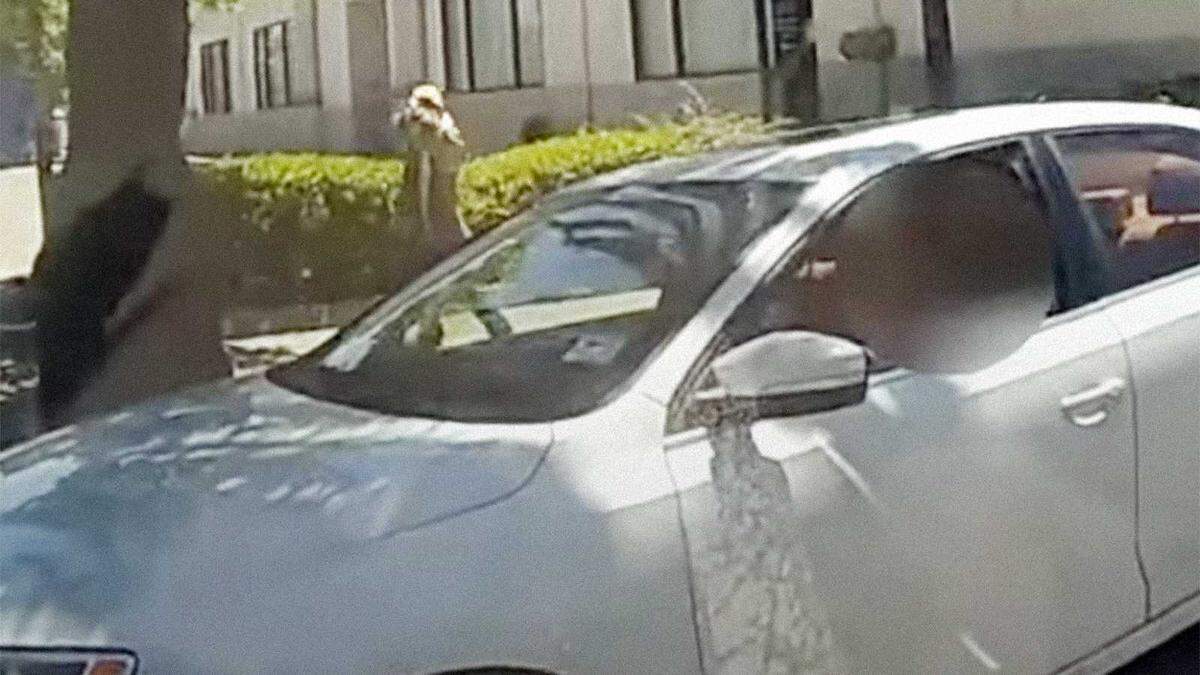 In an image taken from bodyworn video, woman is seen pointing a firearm at Sacramento police officers before she was shot and wounded May 20 near 28th and Q streets in midtown Sacramento. The woman’s weapon was an airsoft pellet gun.