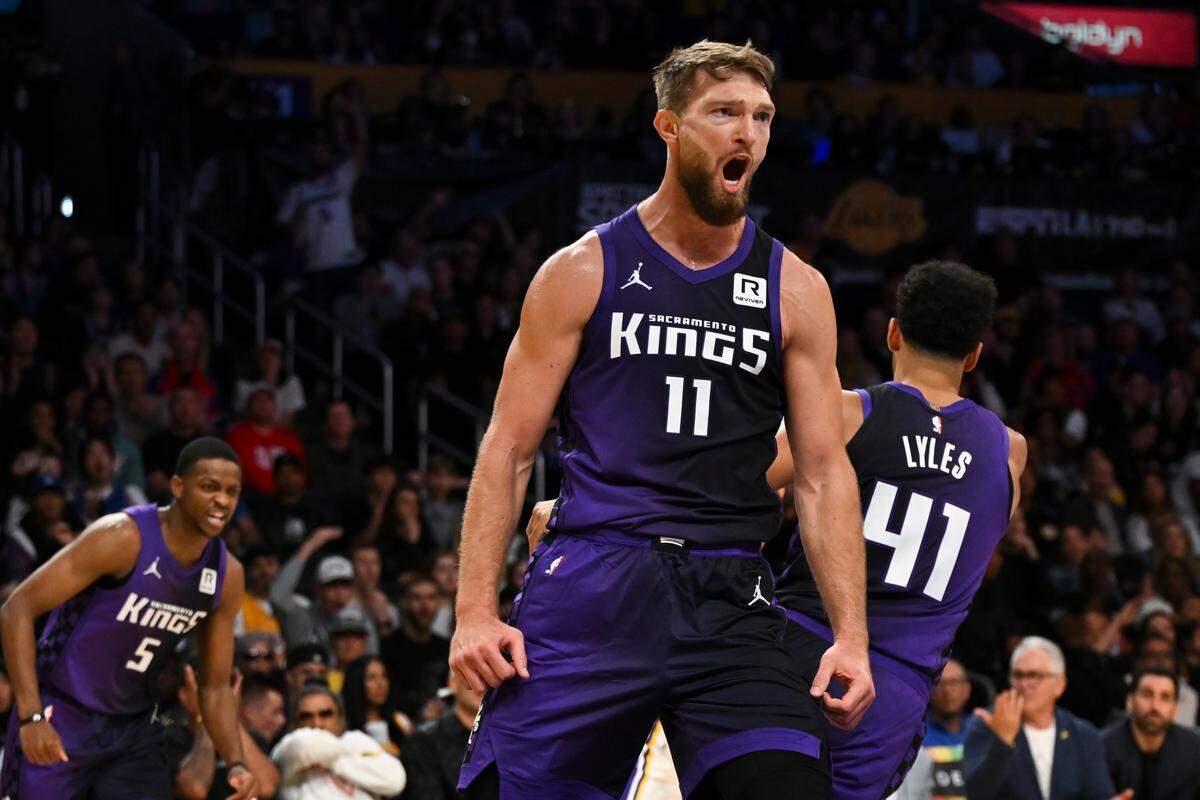 Sacramento Kings center Domantas Sabonis (11) reacts after scoring against the Los Angeles Lakers during the first half Saturday, Oct. 26, 2024, at Crypto.com Arena in Los Angeles.