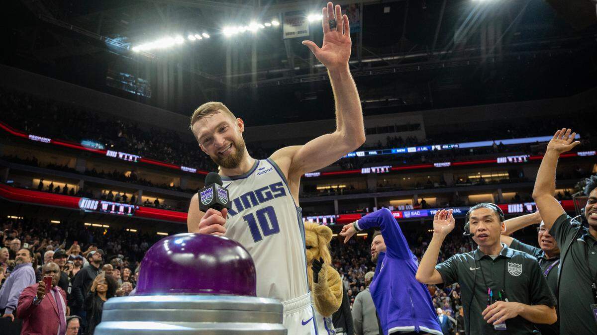 Sacramento Kings forward Domantas Sabonis (10) lights the beam after the Kings win 118-113 over the Oklahoma City Thunder at Golden 1 Center in Sacramento, Friday, Jan. 20, 2023.