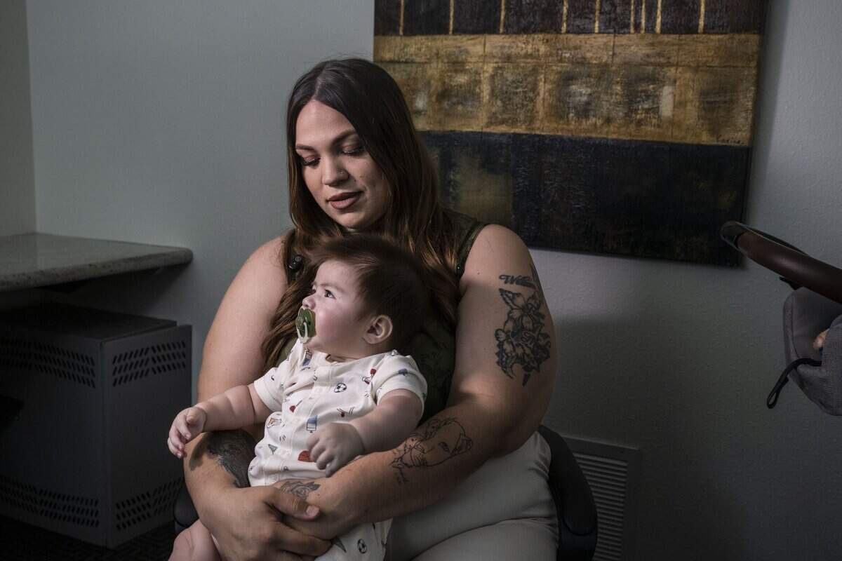 Maria Melendez, the wife of Esparto fireworks explosion victim Joel Melendez Jr., talks about her husband on Wednesday, June 17, 2026, at her apartment complex in Walnut Creek, as she holds her son Jeremiah Melendez, who was born after his father’s death.