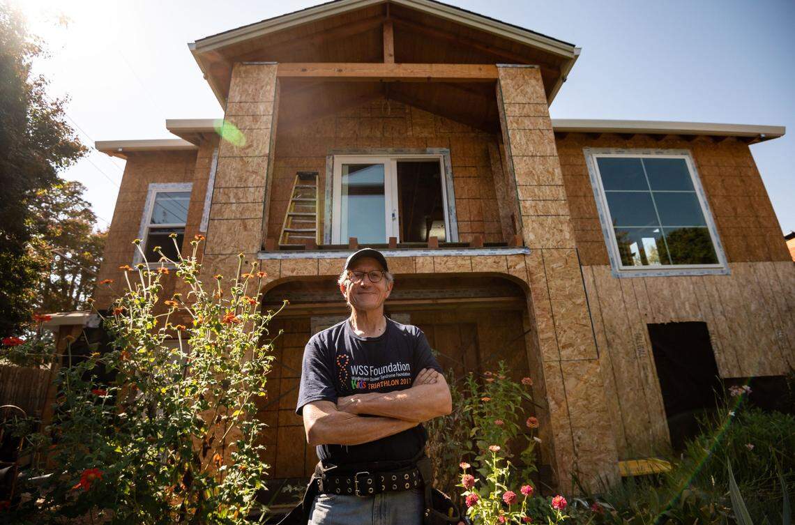 Then-City Councilmember Jeff Harris stands in front of the accessory dwelling unit — commonly known as an ADU — he was building above his garage the River Park neighborhood of Sacramento in 2021.