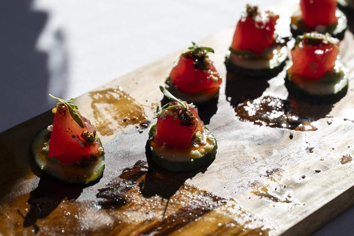 An appetizer, made from compressed watermelon, cucumber and avocado, is served at the Tower Bridge Dinner on Sunday, Sept. 7, 2025.