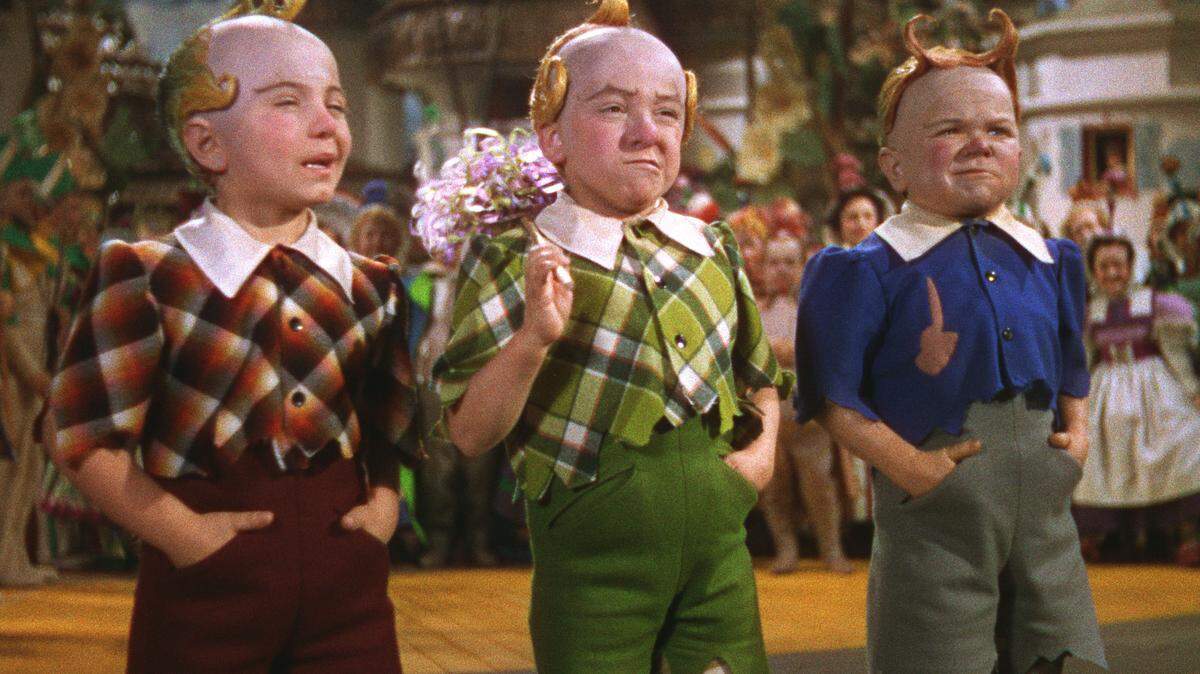 The three members of the “The Lollipop Guild” performing in The Wizard of Oz. From left to right: Jakob Gerlich, Jerry Maren and Harry Doll