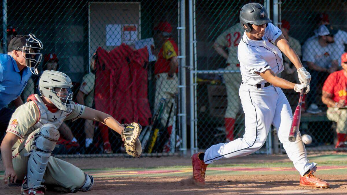 Vacaville’s Kenny DeCelle (23) hits a single in the bottom of the sixth inning during the Sac-Joaquin Section Division I baseball championship game Jesuit at Union Stadium at City College Monday, May 27, 2019. Vacaville beat Jesuit 5-2.