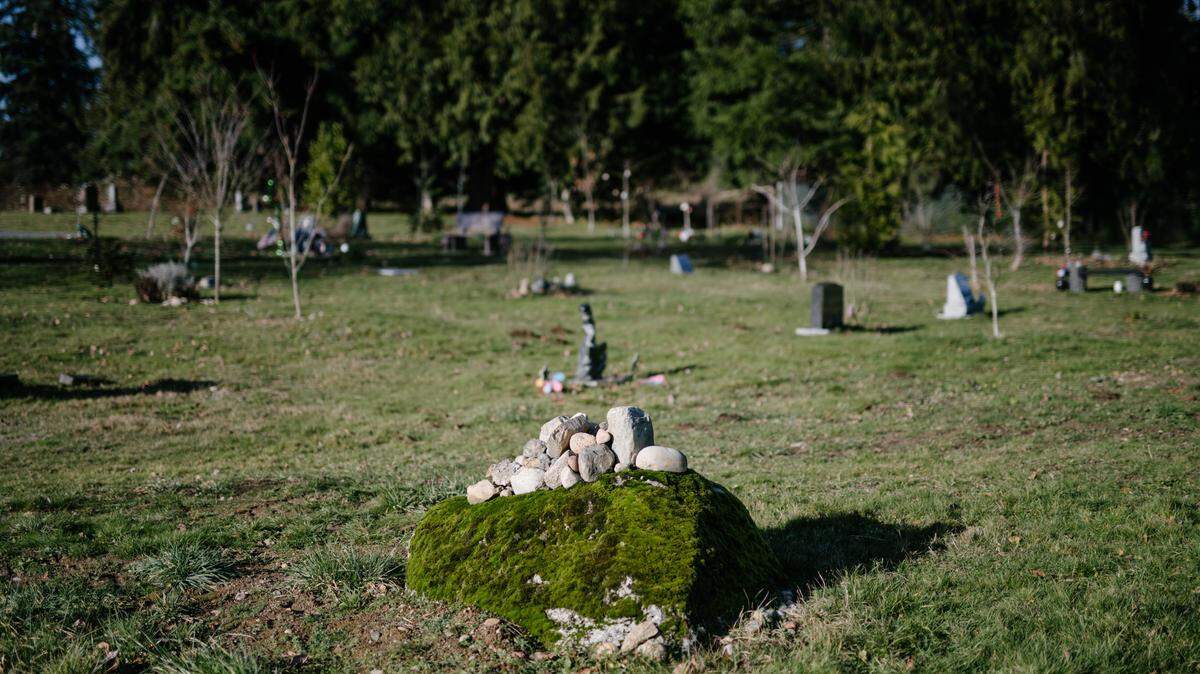 A boulder from an old river bed found on Woodlawn Cemetery’s land acts as a headstone for several green burial plots, in Snohomish, Wash., Jan. 7, 2019. Washington became the first state to permit human remains to be reduced to soil through composting, or recomposition. (Grant Hindsley/The New York Times)