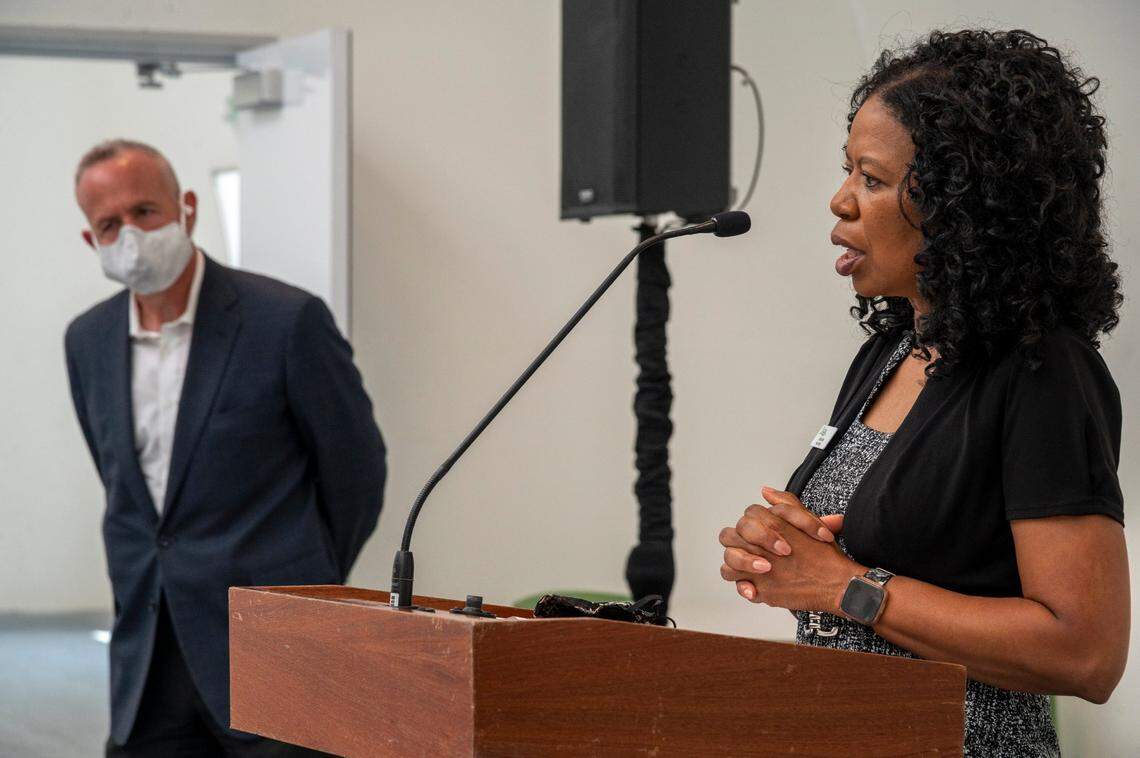 La Shelle Dozier, executive director of the Sacramento Housing and Redevelopment Agency, right, joins Sacramento Mayor Darrell Steinberg, left, and members of the City Council on Monday, Aug. 17, 2020, at a press conference in Meadowview detailing the spending of up to $62.3 million in state and federal funds to address homelessness and the shortage of affordable housing.