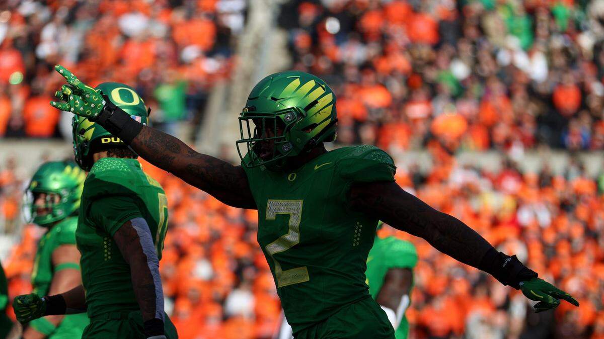Oregon linebacker DJ Johnson (2) reacts to a turnover on downs during the second quarter against Oregon State at Reser Stadium in Corvallis, Oregon, on Saturday, Nov. 26, 2022.