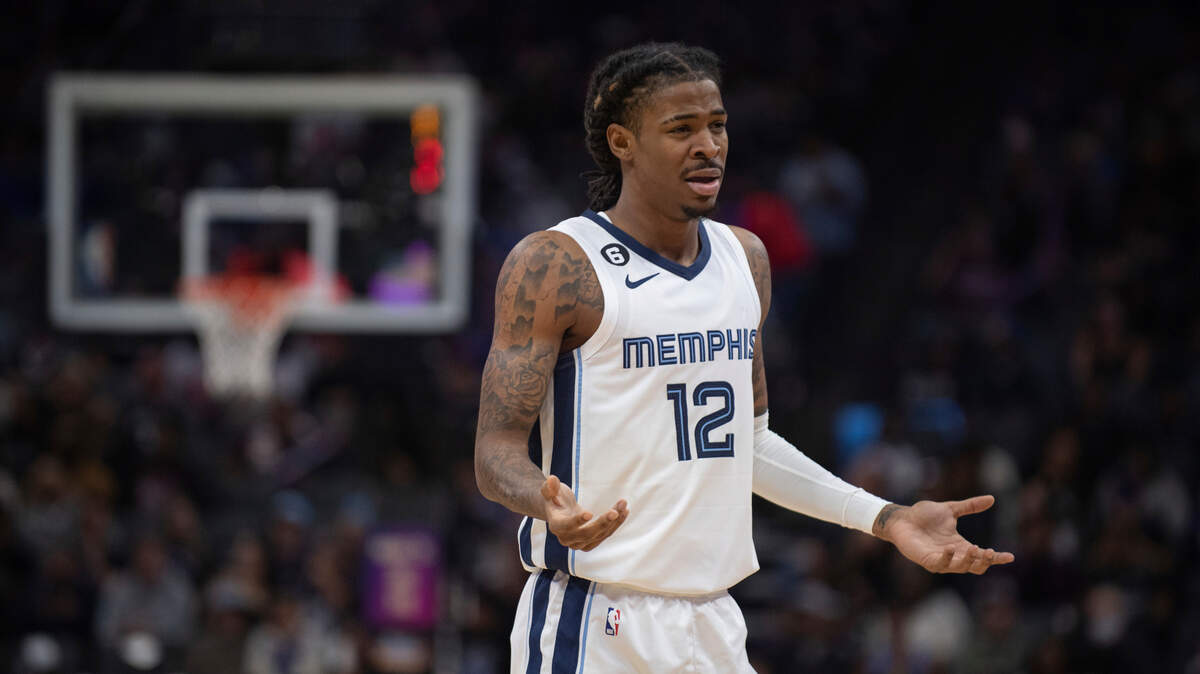 Memphis Grizzlies guard Ja Morant (12) reacts after a foul call in the first quarter of an NBA basketball game against the Sacramento Kings in Sacramento, Calif., Thursday, Oct. 27, 2022. (AP Photo/José Luis Villegas)