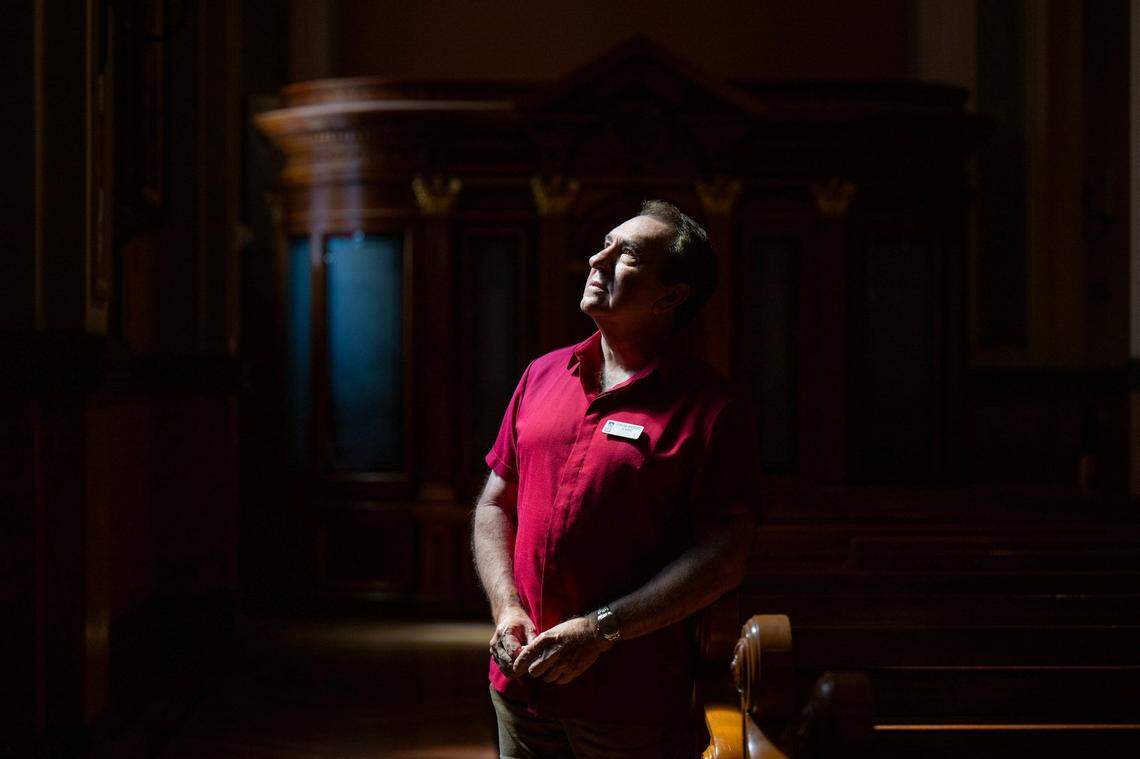 Docent Oscar Ramirez, who gives weekly tours in English and Spanish at the Cathedral Blessed Sacrament in downtown Sacramento, looks up at the building’s splendor on Tuesday.