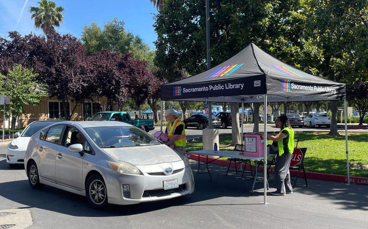 Natomas residents drop off their ballots at the South Natomas library drive-thru voting center on Tuesday, June 2, 2026. Residents voted on California’s next governor among other leadership positions within the state and local government.