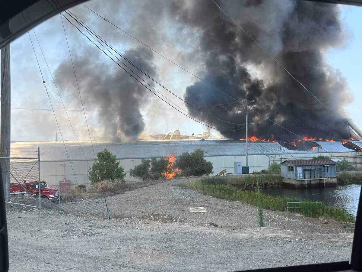 The Ampine facility, a timber processing company in Martell, Calif., became fully engulfed in flames Monday, July 25, 2022, Cal Fire officials said. The fire spread to vegetation.