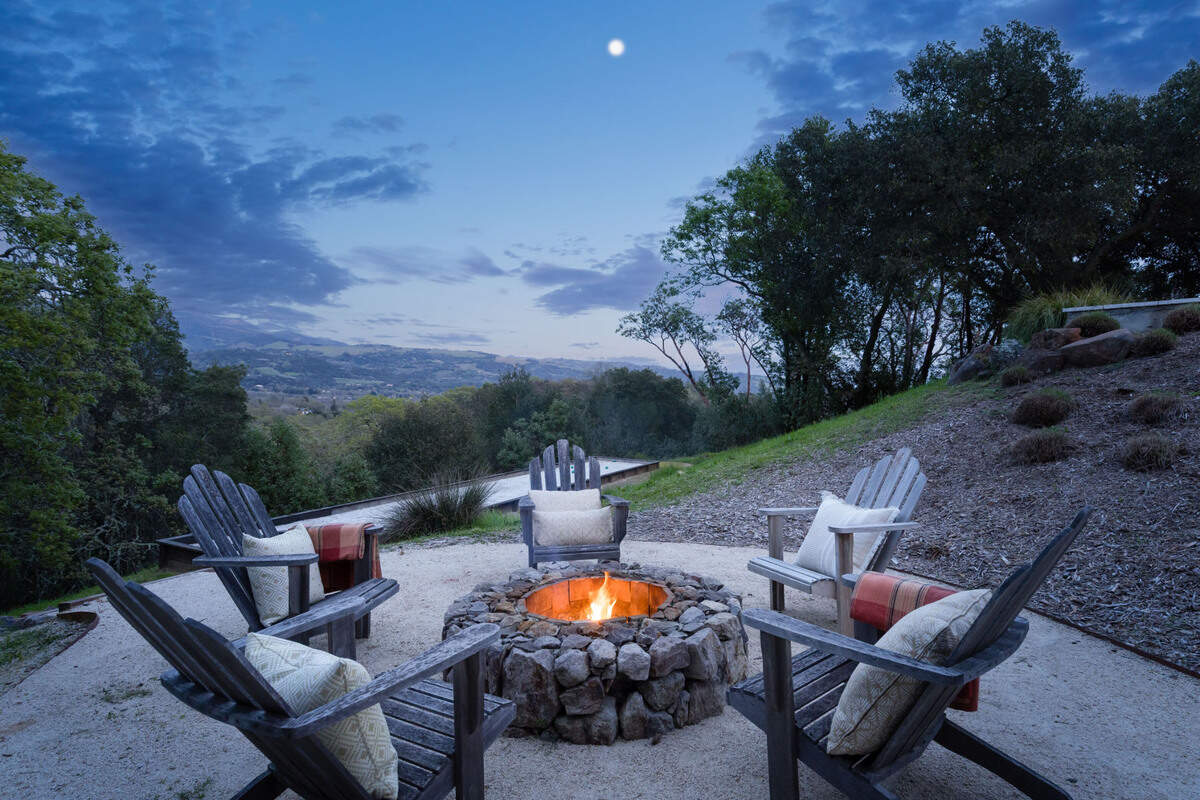 The outdoor fire pit with wonderful California wine country views is just one of the many outdoor features.