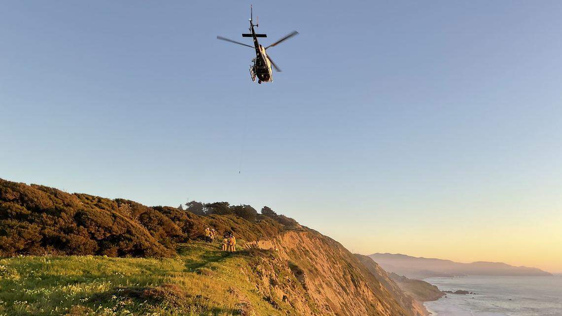 A California Highway Patrol helicopter helped rescue a hiker stranded 500 feet down a Daly City cliff, firefighters reported.