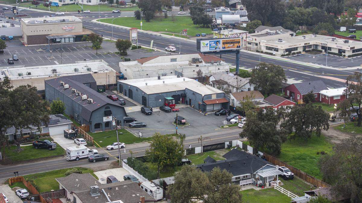 Law enforcement officers investigate on Nov. 30 the site of a mass shooting near Stockton the night before. Authorities said four were killed and 11 were injured in the shooting outside a child's birthday party.