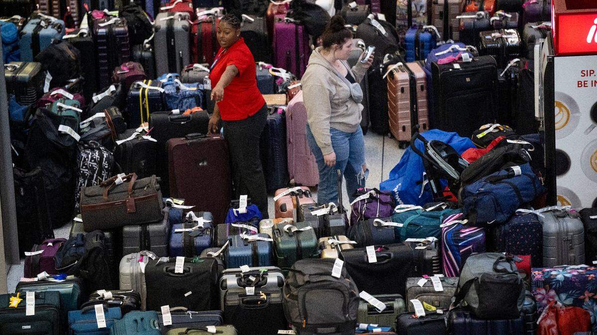 Unclaimed luggage seen at Sacramento International Airport on Dec. 27 amid a wave of Southwest Airlines cancellations and delays.