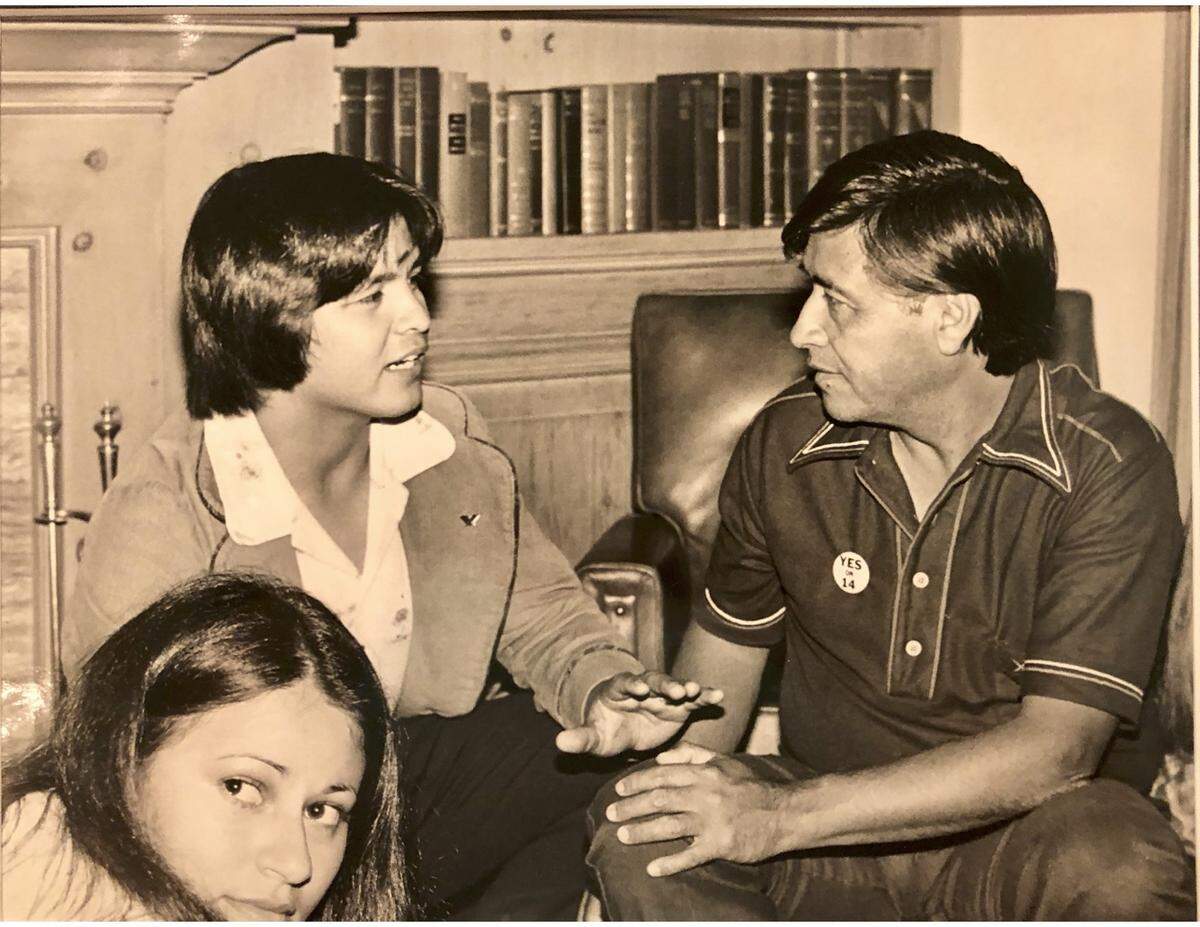 Luis Céspedes talks with labor activist Cesar Chavez in 1976.