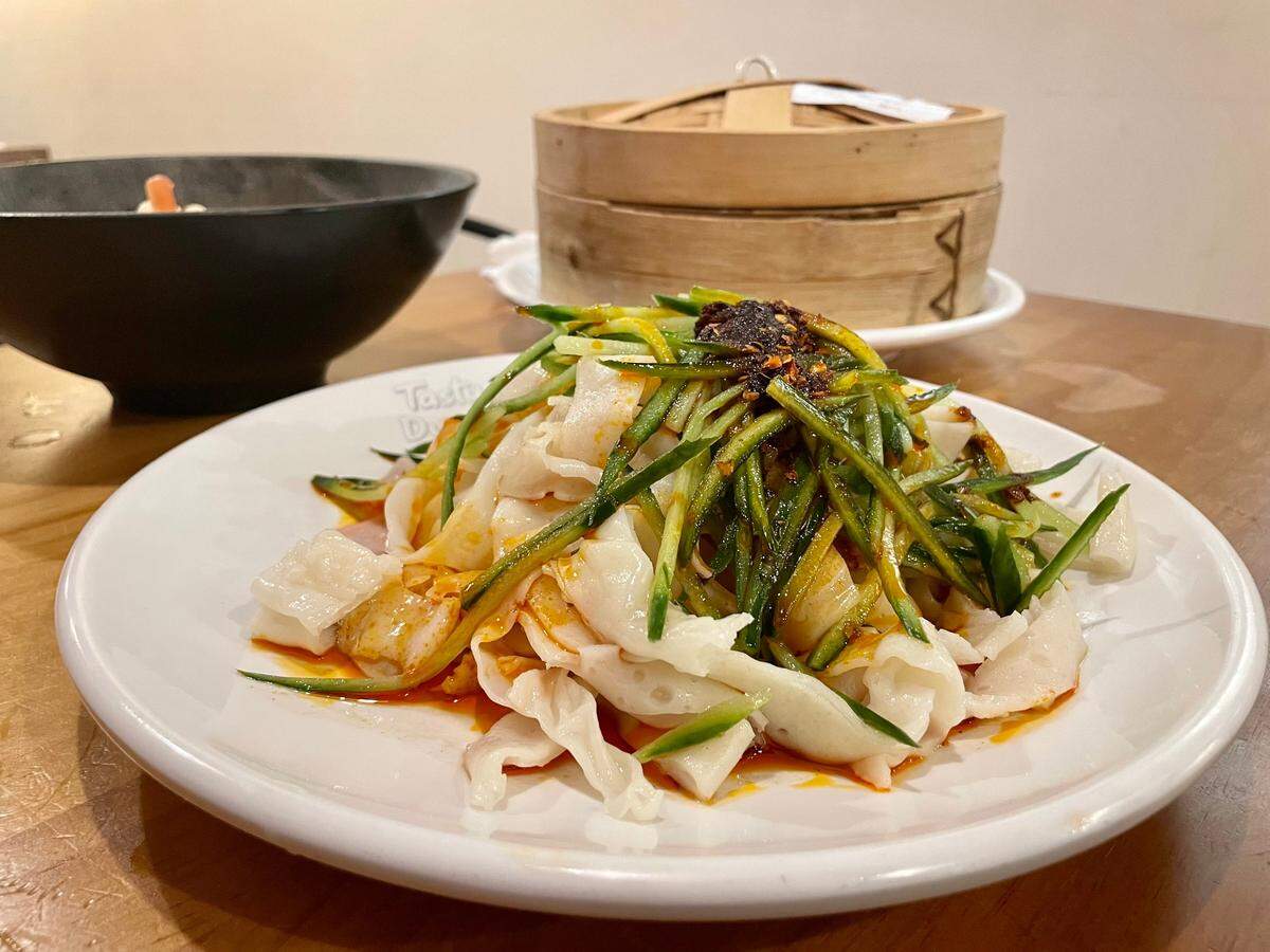 Tasty Dumpling’s Xi’an cold noodles take their heat from a red chili-paprika-cayenne oil over the top.