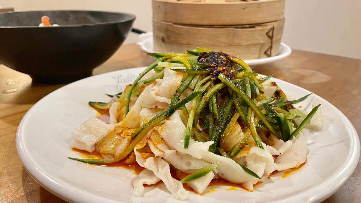 Tasty Dumpling’s Xi’an cold noodles take their heat from a red chili-paprika-cayenne oil over the top.