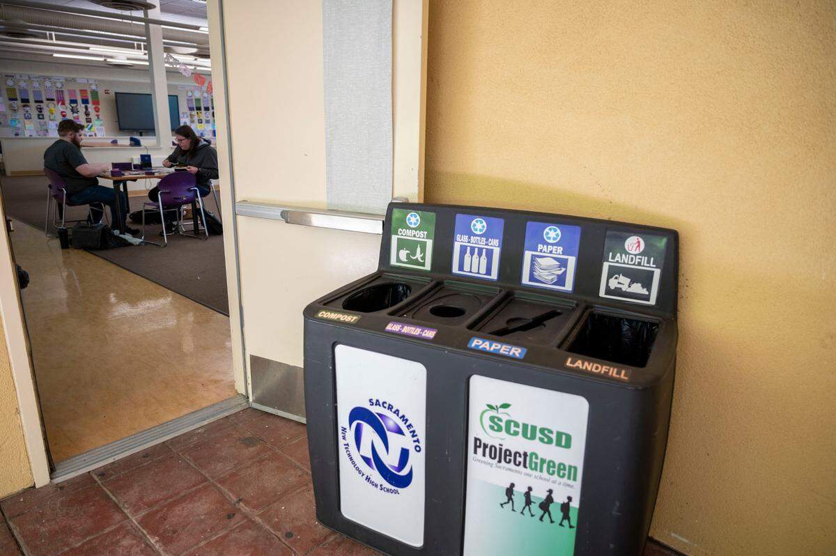 Bins are placed outside classrooms to separate food scraps to be composted in preparation for a student garden at New Technology High School on Wednesday, April 24, 2024.