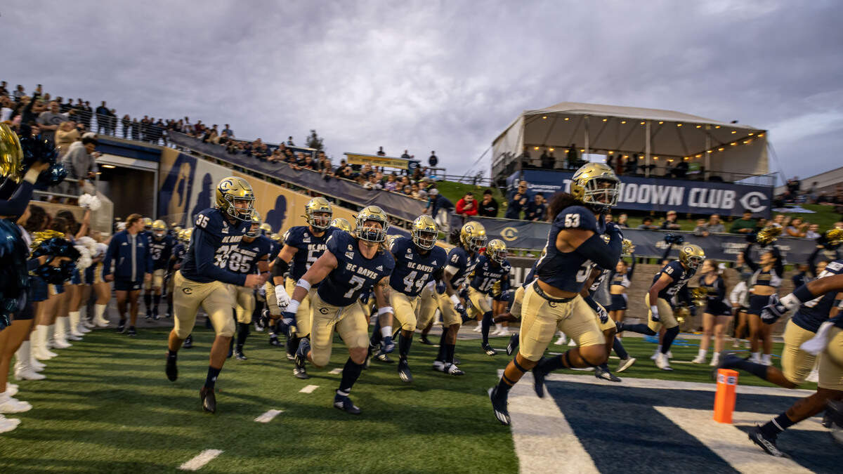 UC Davis takes the field before their NCAA college football game against the University of San Diego on on Sept. 17 at the Aggies’ home opener at UC Davis Health Stadium.