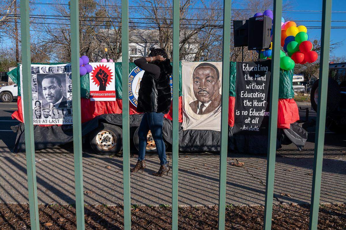 The main float for the #ReclaimMLK Day car caravan waits to begin the celebration of Martin Luther King Jr. Day at Grant High School in Sacramento on Monday, Jan. 18, 2021.