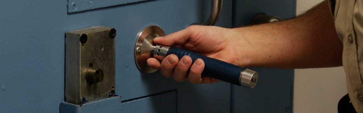 The Pipe, an electronic device marketed by Ohio-based TimeKeeping Systems, is a 7-inch-long electronic device featuring a stainless steel bar that guards strike against a metal disc on cell doors as they conduct their checks.