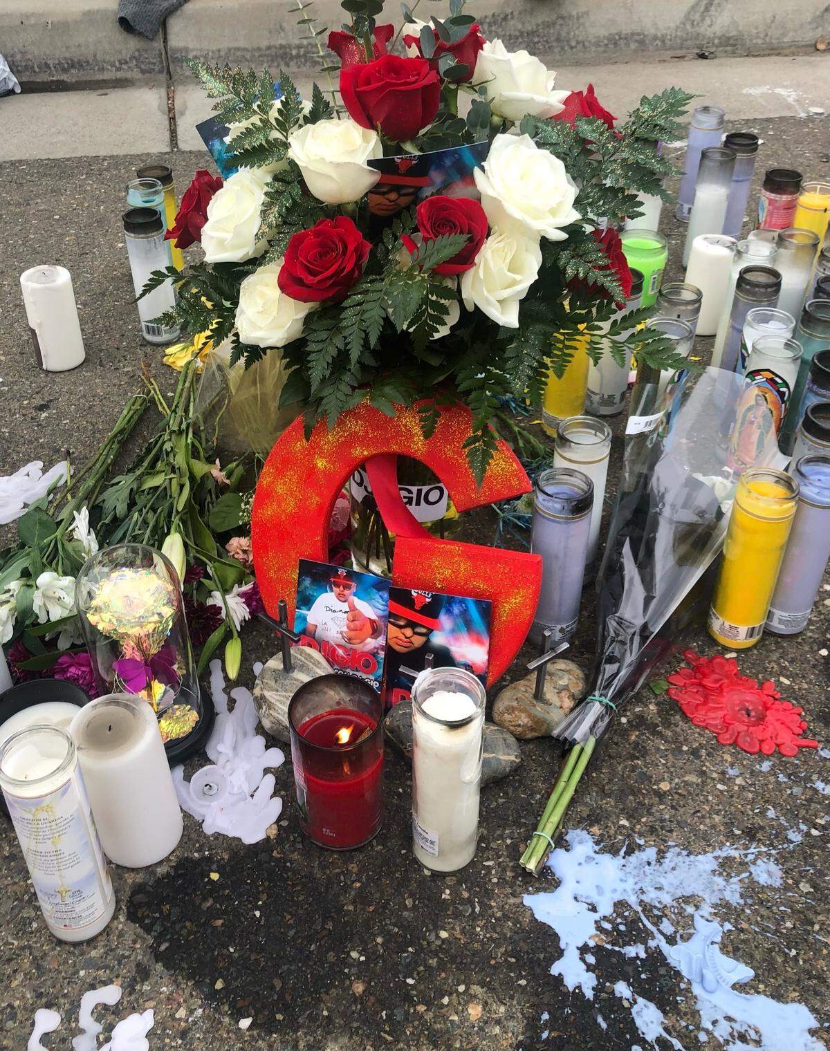 A memorial established by friends, family and loved ones near 2500 Amelia Earhart Avenue in Sacramento’s Natomas Crossing neighborhood, where police said two men were killed early Sunday, April 10, 2022. Anita Razo said her son Giovanni Pizano, better known as DJ Gio, was killed.