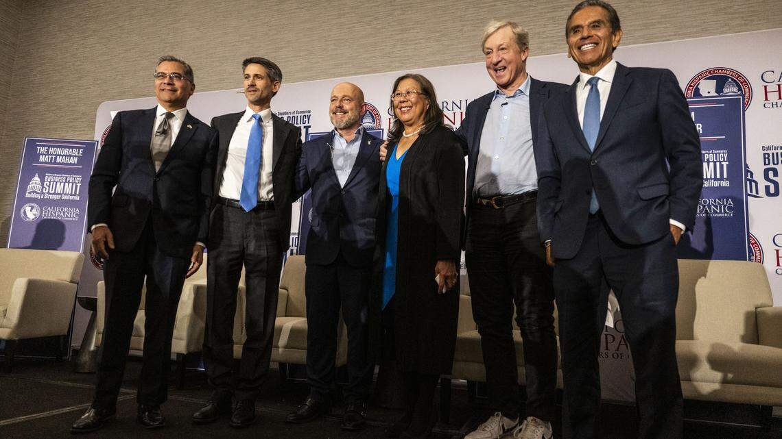 Gubernatorial candidates, Xavier Becerra, Matt Mahan, Steve Hilton, Betty Yee, Tom Steyer and Antonio Villaraigosa stand for a photo during a forum by the California Hispanic Chambers of Commerce in Sacramento on Tuesday, April 14, 2026.