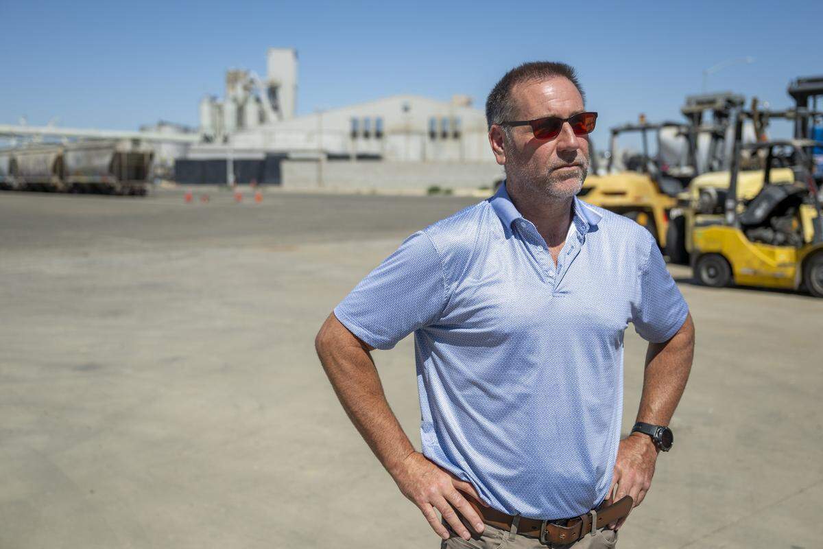 Patrick Soluri, an attorney for International Longshore and Warehouse Union Local 18, speaks with a reporter on Thursday, July 31, 2025 about the effects the proposed Enterprise Bridge in West Sacramento would have on the Port of West Sacramento.