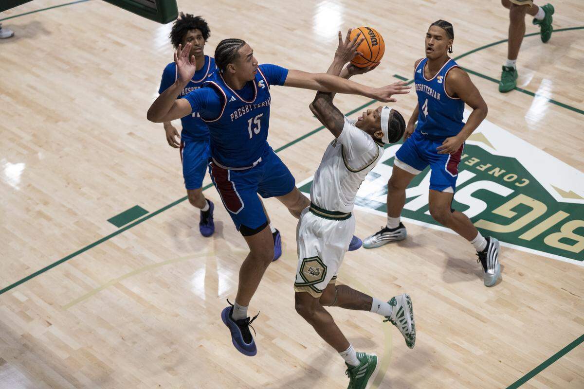 Sacramento State guard Prophet Johnson (16) shoots during a game between Sac State and Presbyterian at Hornet Pavilion in Sacramento on Sunday, Nov. 16, 2025.