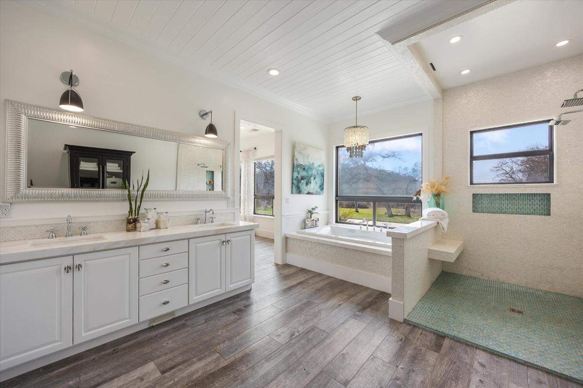 The primary bathroom is luxurious.