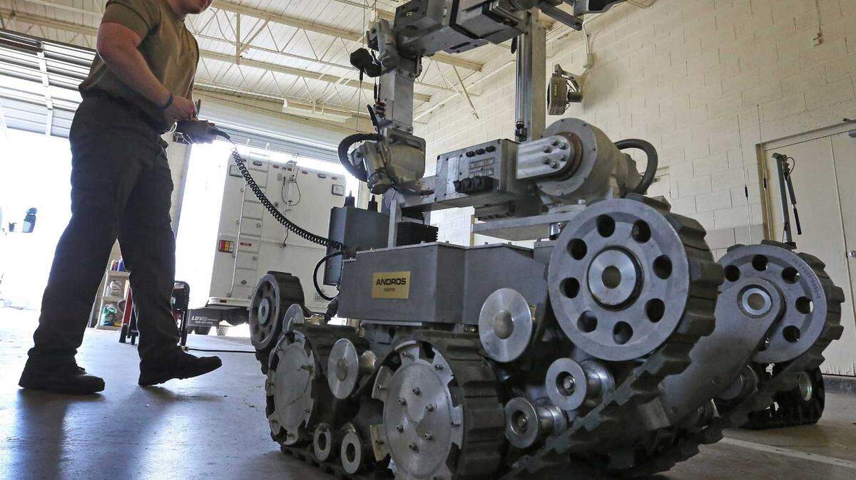 Officer Robby Shreves operates one of the Garland, Texas, Police Department’s bomb robots in 2018. Police in San Francisco were given authorization by city leaders to use remote-controlled robots that could apply deadly force after a heated debate over civil liberties and warnings about the continued militarization of police.