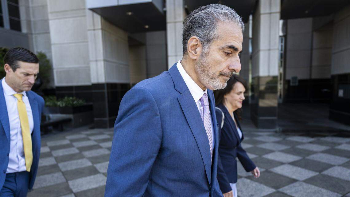 Former Sacramento City Councilmember Sean Loloee, center, leaves the Robert T. Matsui United States Courthouse in Sacramento on Thursday, April 23, 2026, after he plead guilty to charges involving fraud, tax violations and underpaying immigrant workers at his Viva Supermarket stores.