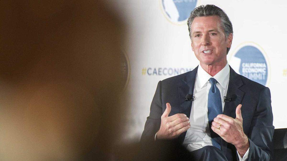 California Gov. Gavin Newsom speaks at the California Economic Summit in Monterey on Tuesday, Nov. 9, 2021. “It’s been a hell of a couple years for all of us, for each and every one of you, particularly parents” Newsom said, explaining his recent hiatus from the public stage.