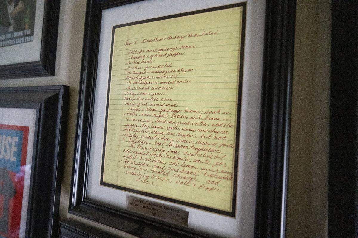 The original handwritten recipe of Dorothea Puente’s garbanzo bean salad, part of a collection of ephemera related to the crimes of the notorious serial killer, hangs in the hall of her former home.