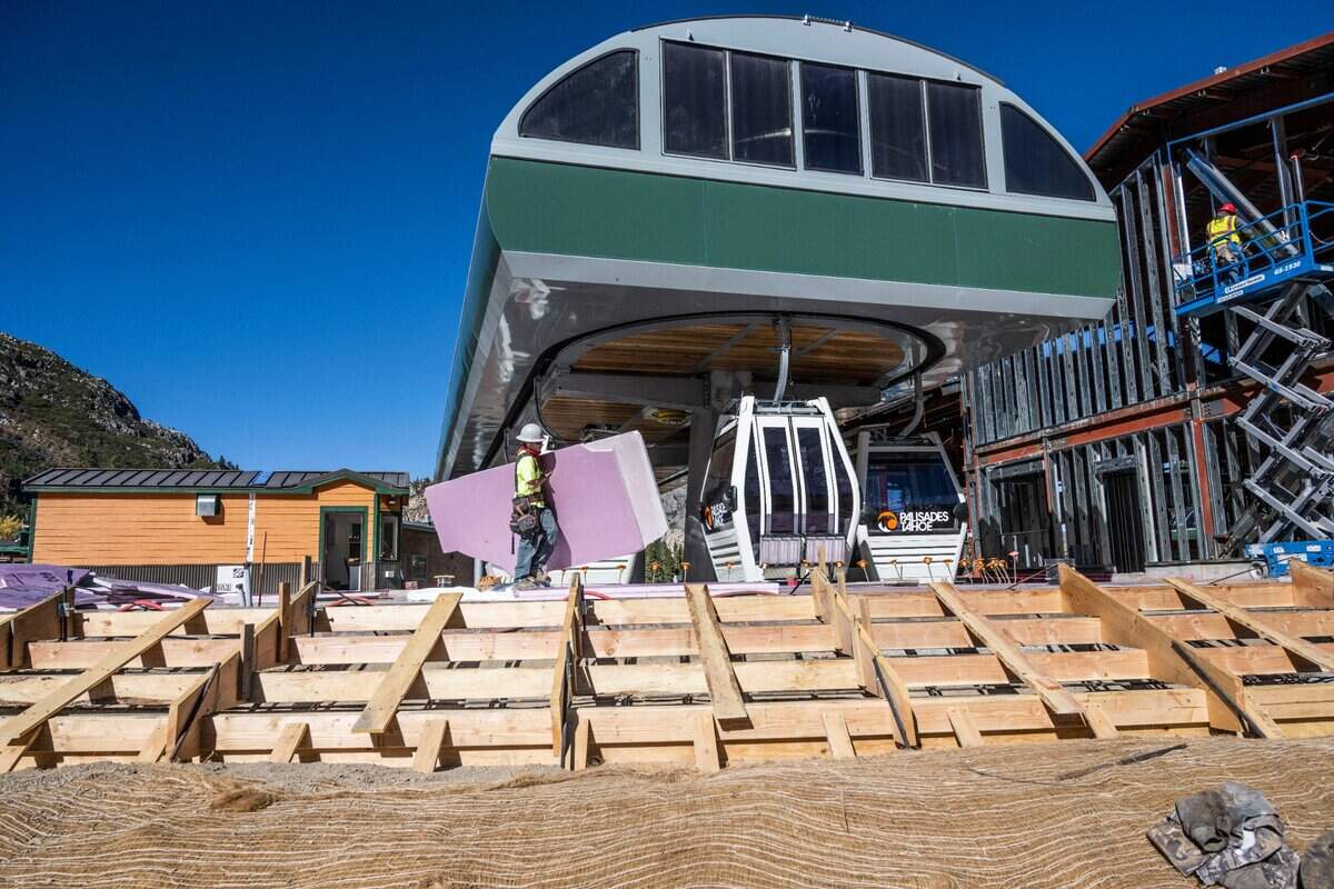 Construction is in full speed as Palisades Tahoe previews the Base to Base Ggondola that will connect the two valleys of the resort – Olympic Valley and Alpine Meadows – on Thursday. The $85 million project is the largest upgrade for Tahoe ski resorts in decades.