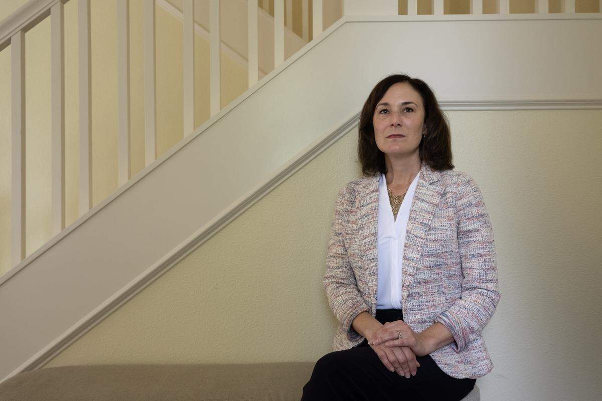 Michele Beckwith, former acting U.S. Attorney for the Central Valley region, poses for a portrait at her home in Davis last month. Her 15 years of service as a prosecutor for the U.S. Department of Justice ended abruptly just hours after she expressed concern about the way the administration was handling immigration raids in the Central Valley.