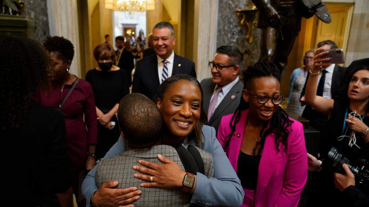 Laphonza Butler is greeted in Statuary Hall at the U.S. Capitol after being sworn in to the Senate on Oct. 3. California Gov. Gavin Newsom appointed Butler, president of Emily’s List, to fill the vacant Senate seat left by Sen. Dianne Feinstein, who died at age 90 in September.
