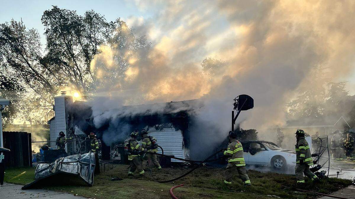 Two people including a Sacramento Metro Fire firefighter suffered minor injuries from a house fire on McKay Street in Fair Oaks on Wednesday, Dec. 1, 2021.