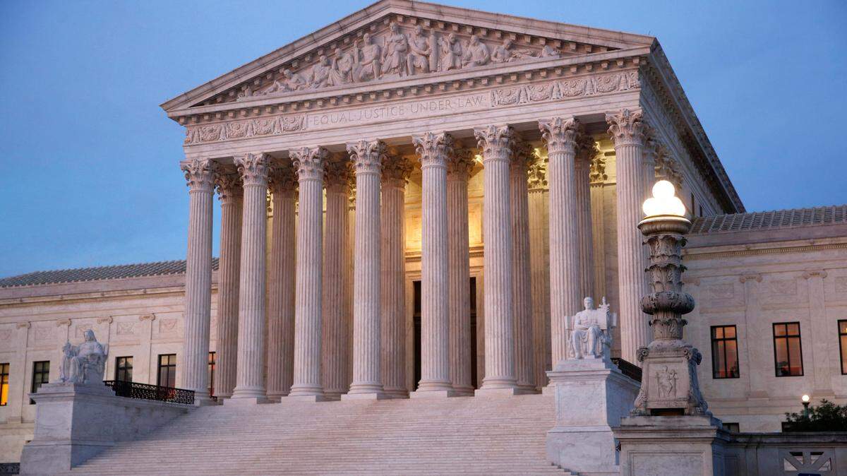 In this May 23, 2019 photo, the U.S. Supreme Court building at dusk on Capitol Hill in Washington. (AP Photo/Patrick Semansky)