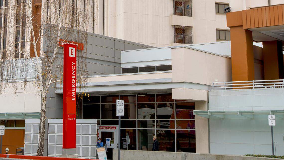 The emergency entrance at the Kaiser Permanente San Jose Medical Center is shown in San Jose, Calif. A Kaiser Permanente employee is dead and dozens of workers have contracted the coronavirus after a staffer appeared at a Northern California medical center wearing an inflatable, air-powered holiday costume on Christmas Day, the hospital and health care company said.